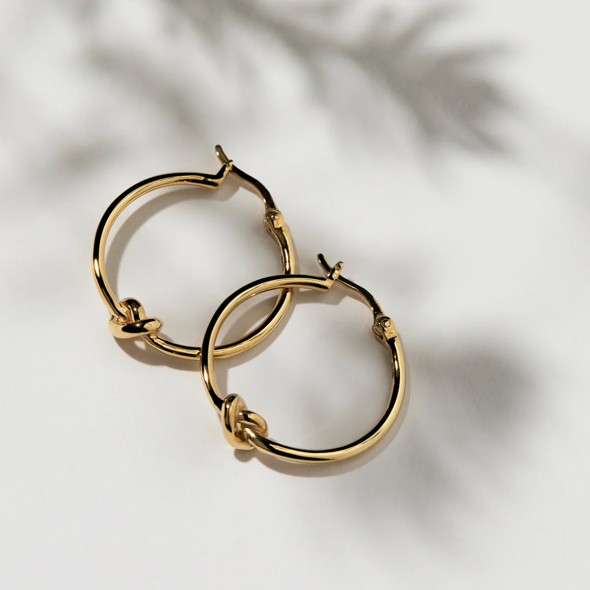 NAJO GOLD PLATED NATURE'S KNOT HOOP EARRING