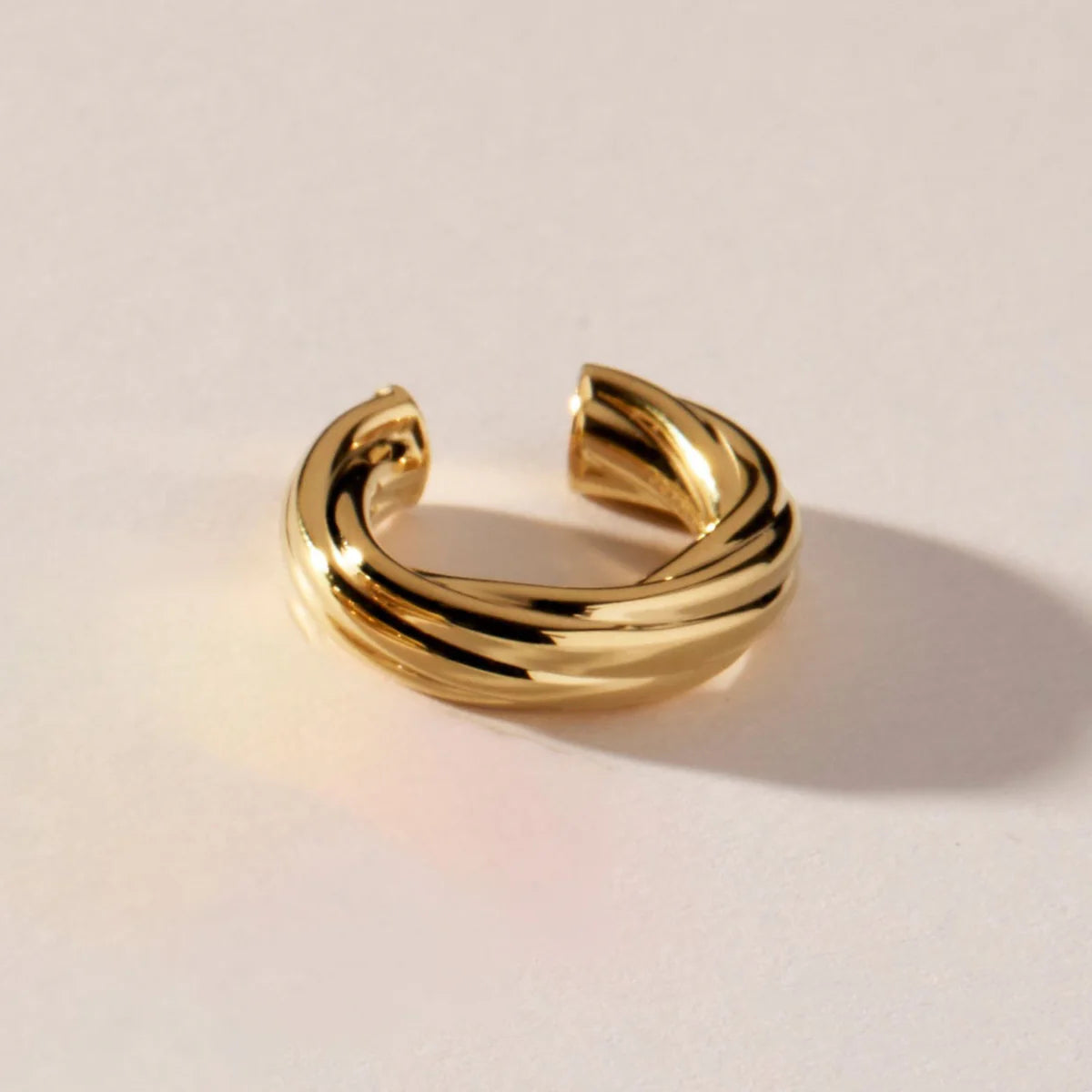 NAJO GOLD PLATED TWISTED HOLLOW TUBE ROUND EARCUFF