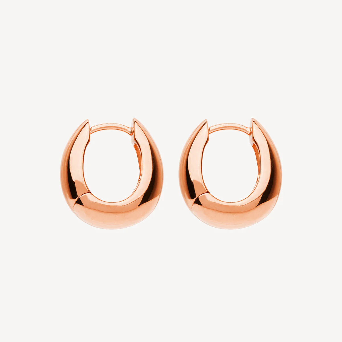 NAJO ROSE GOLD PLATED ARCO HUGGIE EARRING