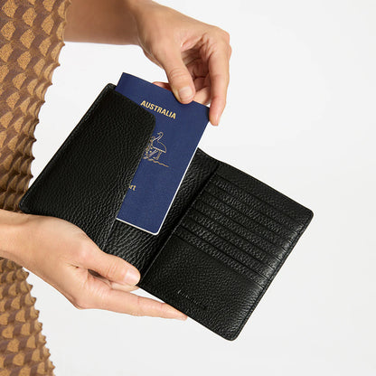 STATUS ANXIETY IN TRANSIT TRAVEL WALLET BLACK